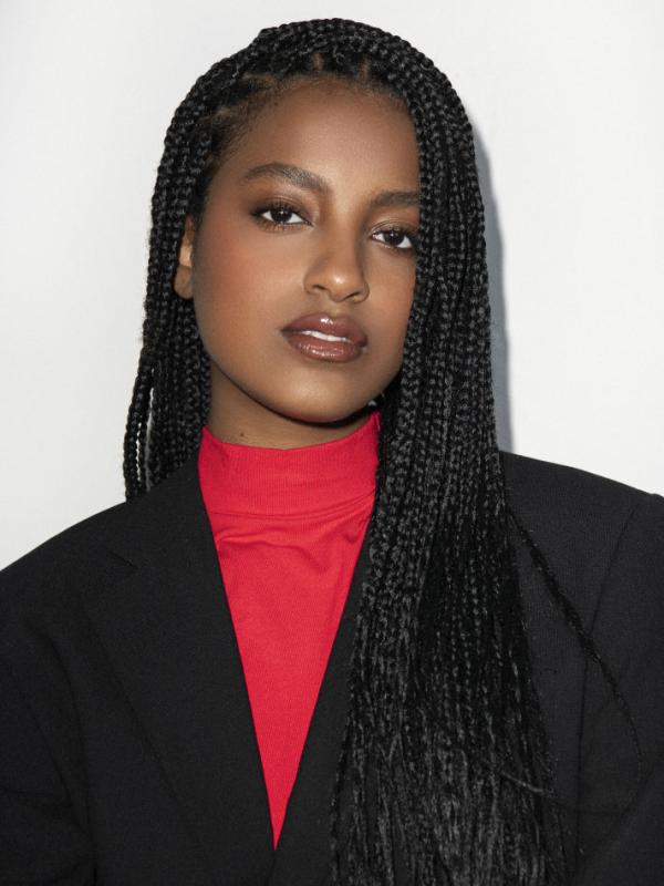 Ethiopia looking into the camera on a white background