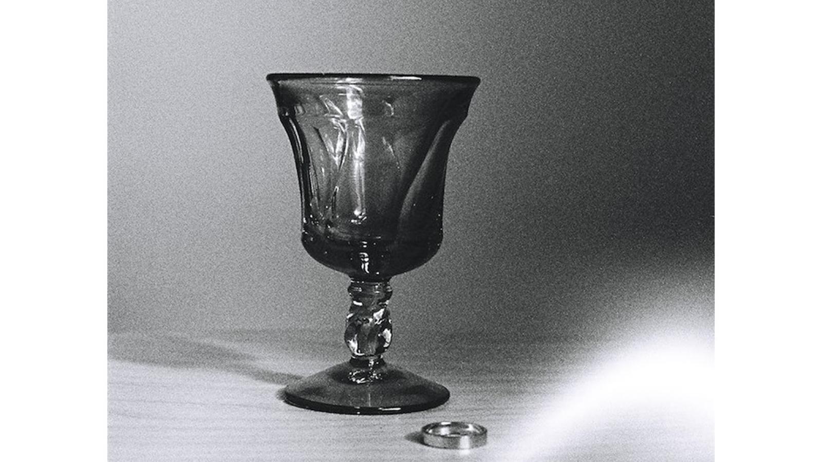 Image of cup and wedding ring 
