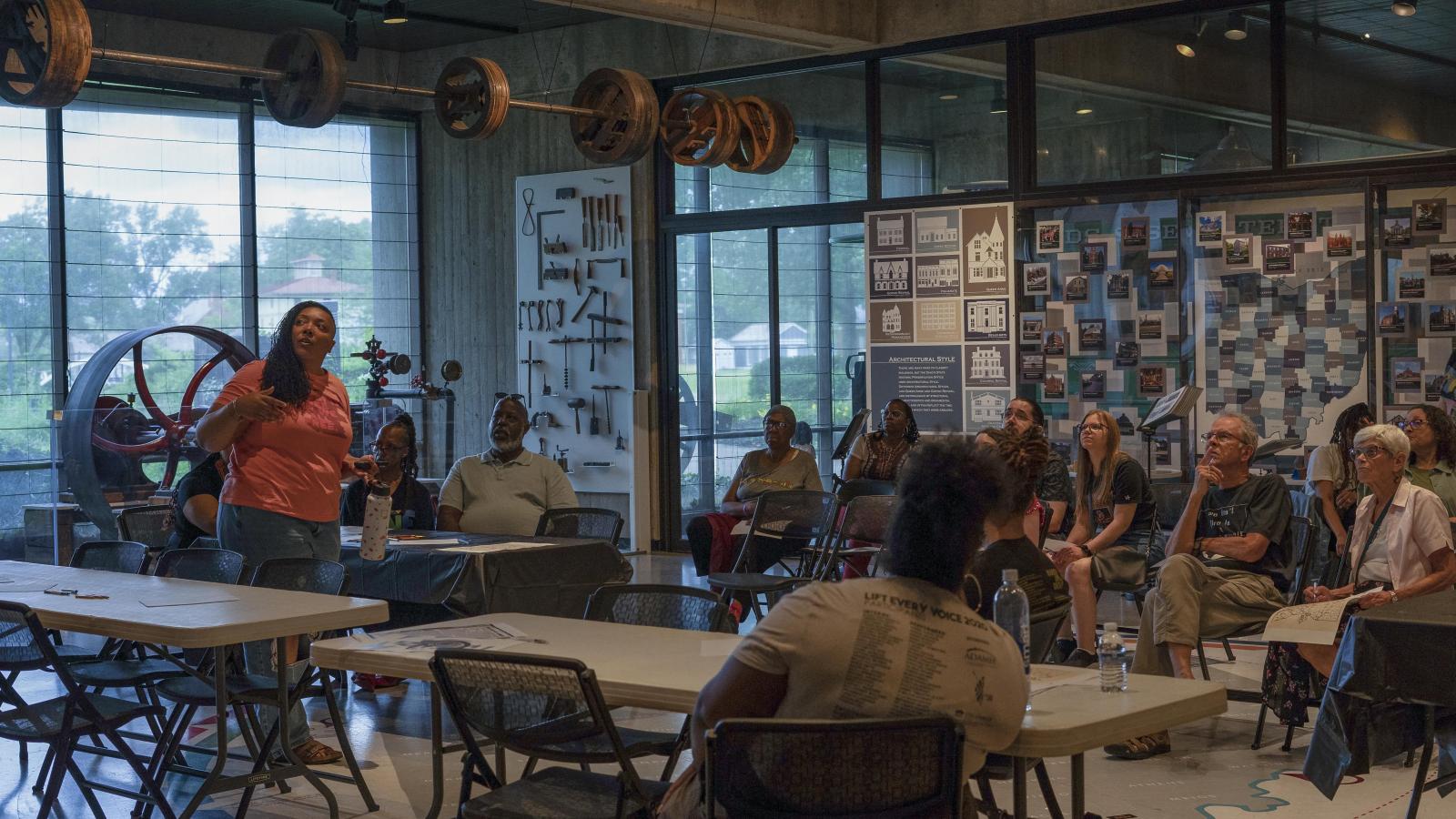 Tyiesha Radford Shorts standing in front of a crowd 