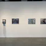 4 artworks displayed on a gallery wall, consisting of 3 digital prints and 1 sculpture