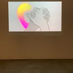 still from a digital animation displayed on a tv screen